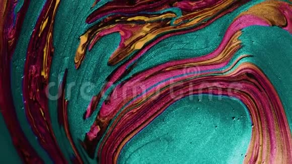 抽象彩色颜料液体扩散螺旋运动视频的预览图
