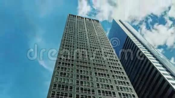 两座现代化的办公楼迎着天空云朵飘荡视频的预览图