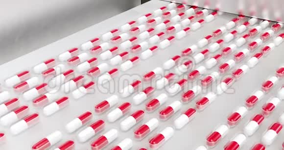 库存视频生产药丸片剂红白胶囊的过程视频的预览图