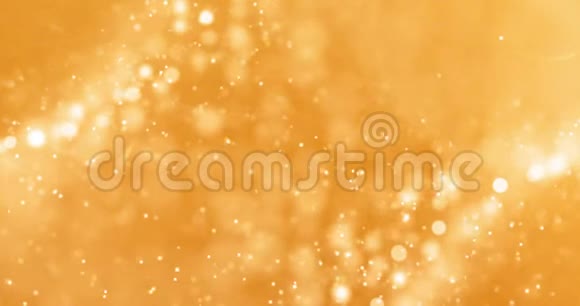 圣诞节黄金渐变闪耀的闪光尘埃粒子从顶部黑色背景与波克流动的运动黄金假日视频的预览图