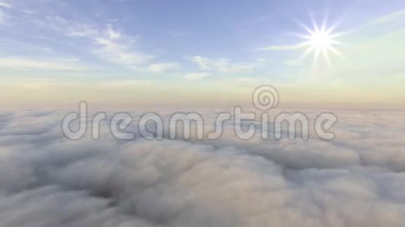 云层上方的空中景色朝向太阳视频的预览图