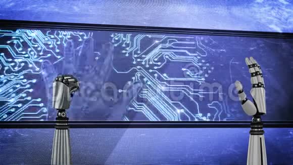 两只机器人手和一个大屏幕上面有发光的电路板和闪烁的手视频的预览图