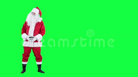 圣诞老人出现在彩色钥匙上绿色屏幕视频的预览图