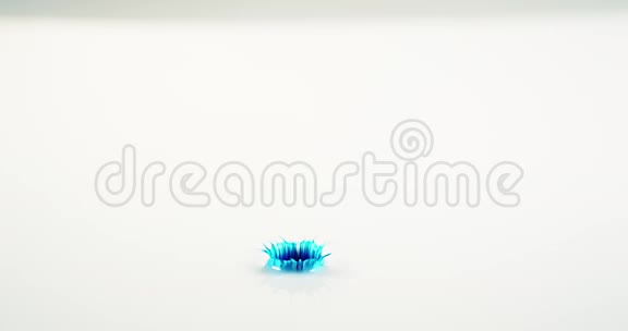 蓝色液体在白色背景下落入水中视频的预览图