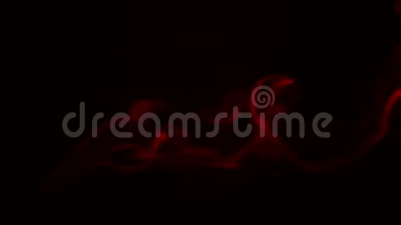 黑色背景下的芳香棒上冒出的红色烟雾视频的预览图