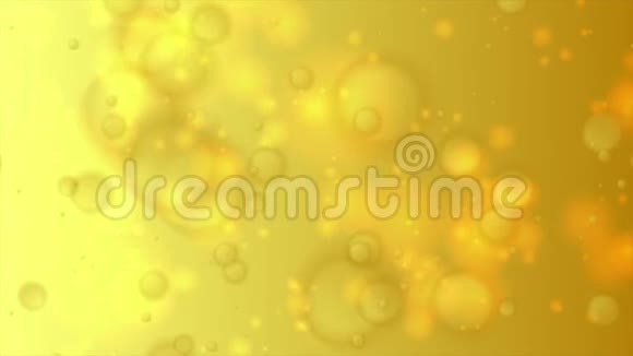 黄色金色的波克光粒子抽象运动背景视频的预览图