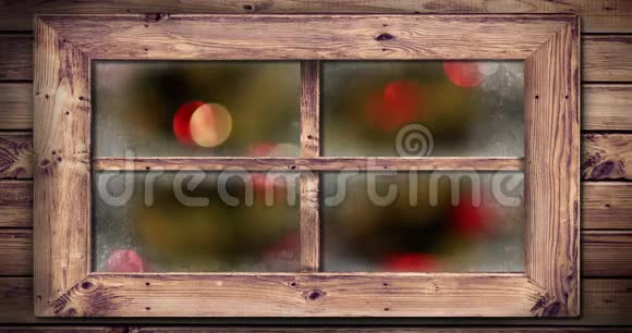 透过窗户看到的圣诞灯视频的预览图