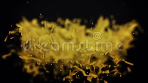 美丽抽象黄色的水溅在黑色背景上的冻结动作中旋转无缝的循环黄金水视频的预览图