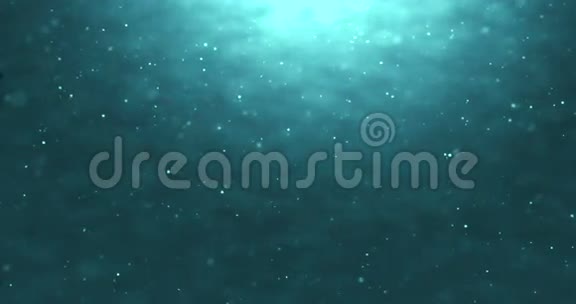 高质量的完美无缝深蓝海浪从水下背景与微粒子流动视频的预览图