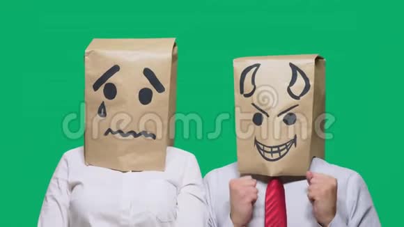 情感概念手势一个头上戴着一个包裹的人脸上涂着微笑哭泣悲伤魔鬼笑了视频的预览图