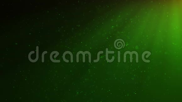 闪光闪闪发光绿色粒子的抽象运动背景美丽的绿色浮尘微粒视频的预览图