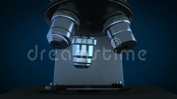 在黑暗实验室里用科学显微镜旋转金属镜片视频的预览图
