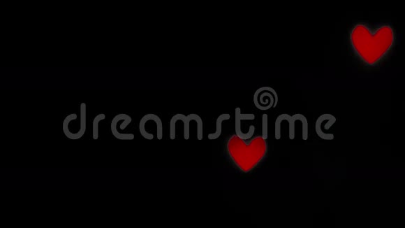 摘要真实的红心在黑色背景下沸腾祝贺情人节和爱情视频的预览图