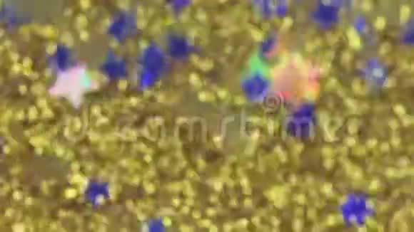 神奇的金色闪光与微小的蓝星缓慢的运动视频的预览图