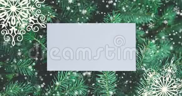 圣诞节背景有杉树枝和雪花顶部视图与字母和复制空间视频的预览图