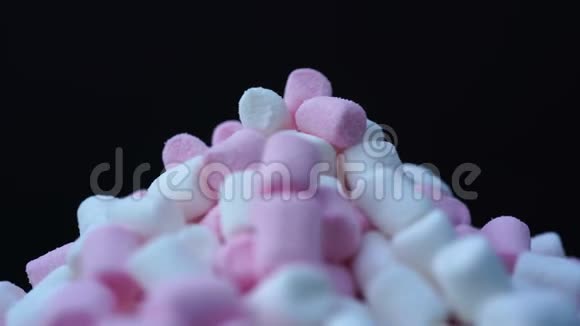 棉花糖粉白色糖果旋转背景视频的预览图