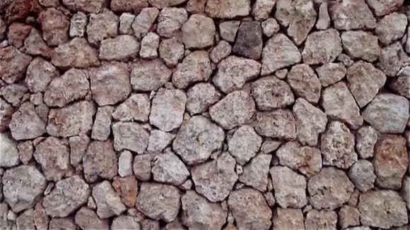 石头和鹅卵石的天然棕色背景视频的预览图
