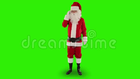 圣诞老人在移动电话绿色屏幕股票录像视频的预览图