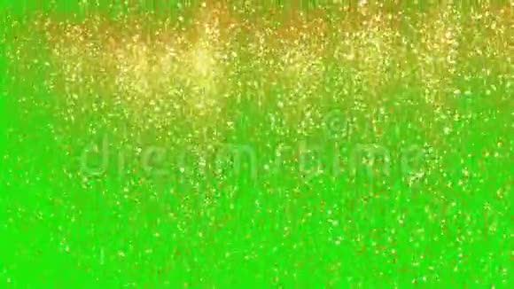 金闪粉雨无缝环绿色屏幕钥匙上的节日金色尘埃视频的预览图
