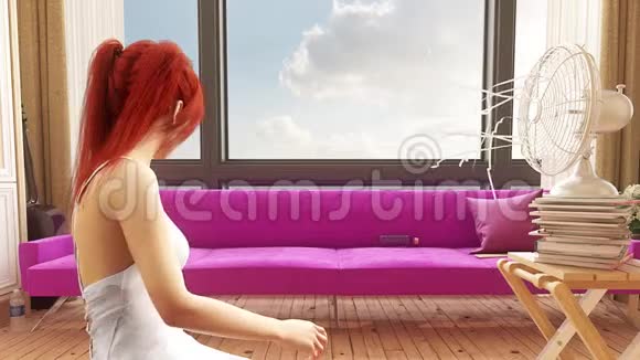一个红头发的女孩坐在风扇前视频的预览图