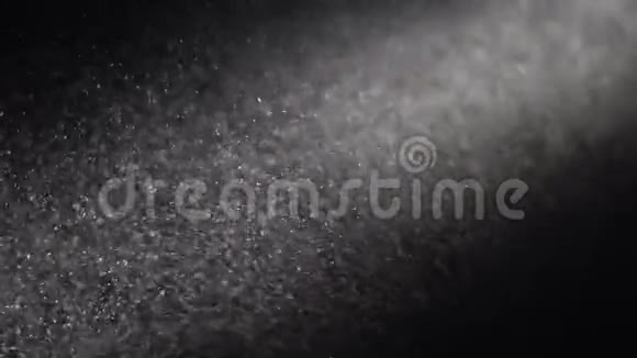尘埃粒子在黑色背景上闪闪发光视频的预览图
