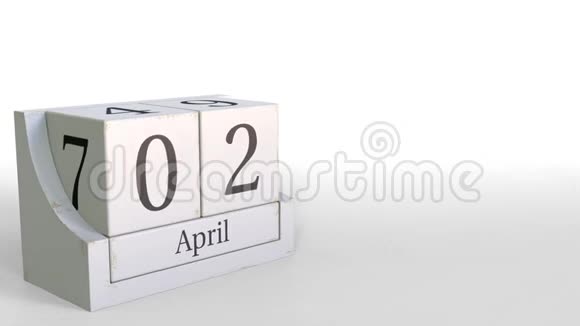 木立方体日历显示4月2日3D动画视频的预览图