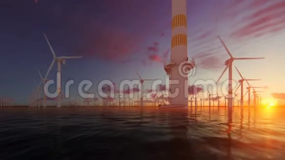 带技术人员船的海上风车对抗美丽的日落4K视频的预览图