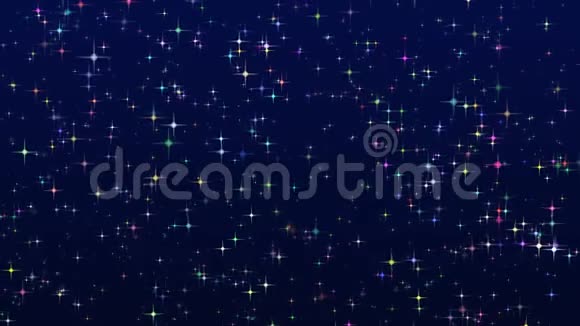 五颜六色的星星在蓝色的背景上闪闪发光视频的预览图