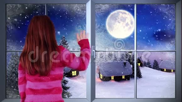 小女孩向圣诞老人挥手飞过村庄视频的预览图