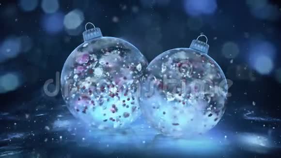 两个旋转的圣诞蓝色冰保布雪彩色花瓣背景循环视频的预览图