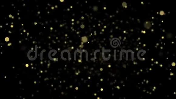 黑色背景中流动的闪烁的金色粒子视频的预览图