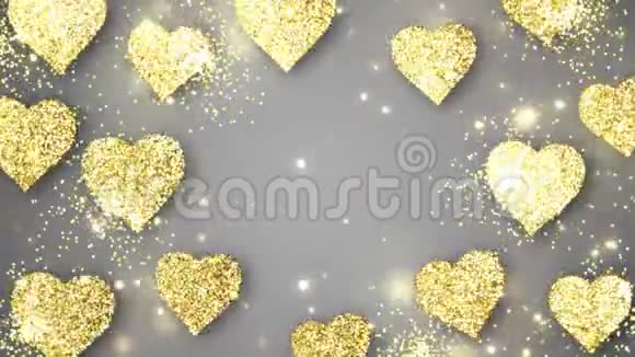 金色闪亮的心在灰色的背景上闪闪发光情人节节日抽象循环动画视频的预览图