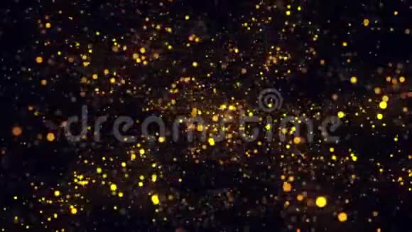 在黑色背景上闪烁的金色粒子旋转的抽象动画录像彩色动画视频的预览图