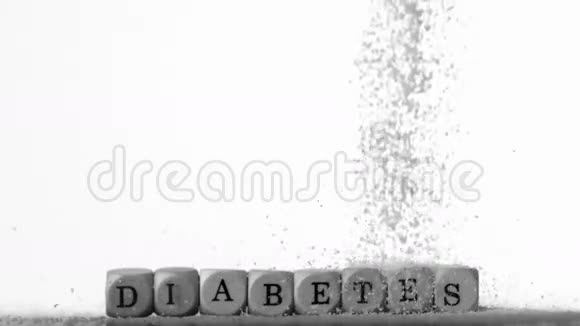 糖粉倒在白色骰子上拼出糖尿病视频的预览图
