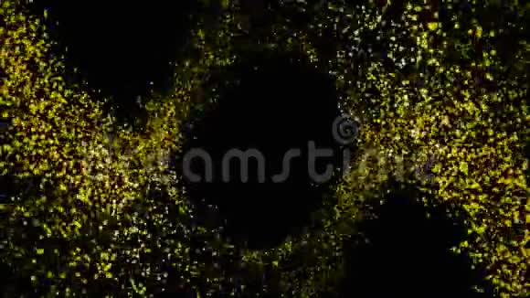 黑色背景上美丽的飞行闪烁的黄色粒子的抽象动画五颜六色的火花视频的预览图