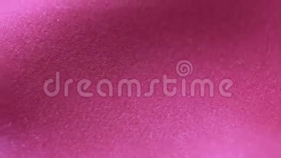 柔和优雅的淡紫色丝绸或缎质质地可作为背景软组织视频的预览图