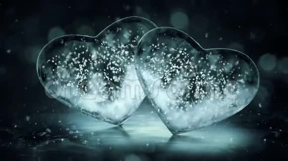 两颗灰色诺厄冰玻璃心与雪花内部运动背景回路4k视频的预览图