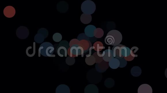 提取许多大大小小的彩色点或气泡混沌地漂浮在黑色背景上闪烁视频的预览图