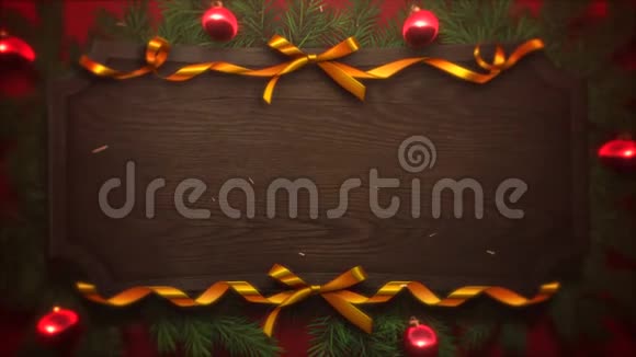 动画特写红球和圣诞树树枝在木头背景上视频的预览图