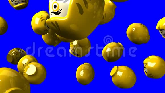 蓝色钥匙上的黄色达鲁玛玩偶视频的预览图