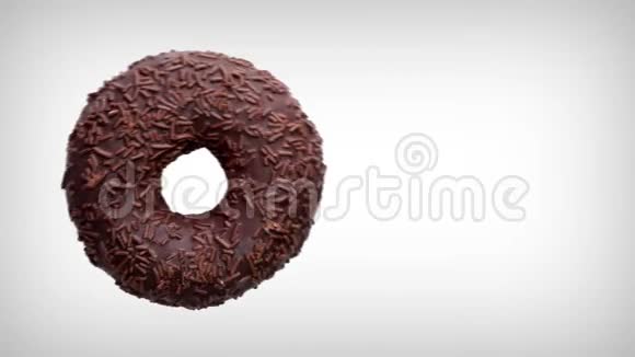 动画一个带有巧克力的甜甜圈是在白色背景下吃的顶部视图视频的预览图