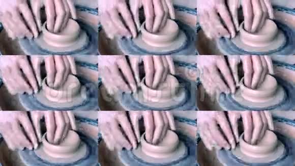 女子双手托着壁壶用陶泥在圆圈上雕刻出来视频的预览图