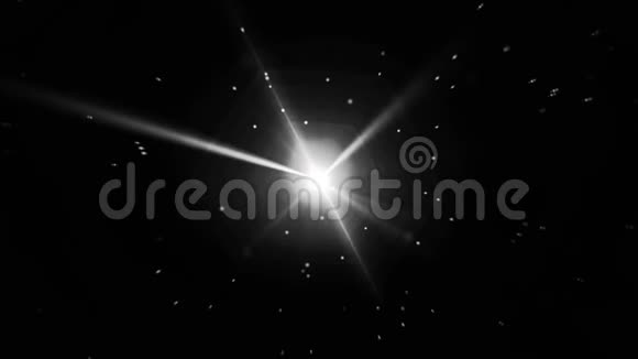 抽象的白色星射线间歇性旋转黑色背景上有许多小粒子无缝环明亮明亮视频的预览图