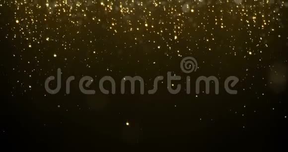 抽象金颗粒发光下降bokeh眩光效应闪闪发光的金色小雨纹理为奢侈品发光视频的预览图