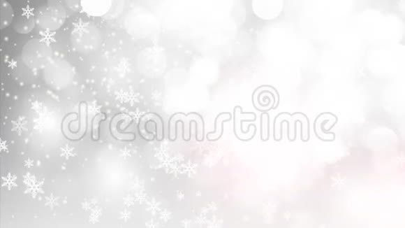 银色的背景与飘落的雪花视频的预览图