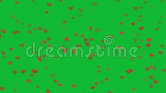 浪漫的红心在绿色的背景下飞翔视频的预览图