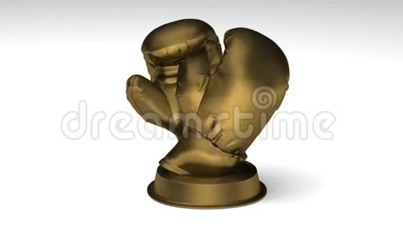 在一个旋转的金色拳击奖杯上特写视频的预览图