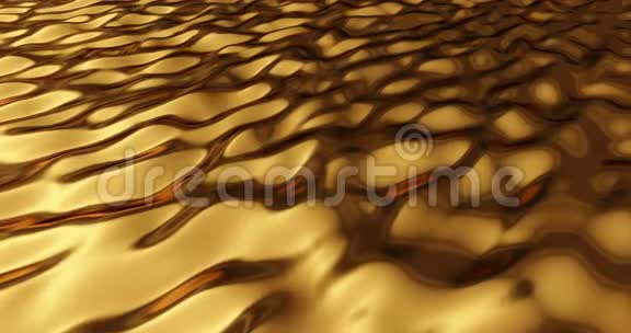 抽象的运动金色的闪光波像物质流动金色的金属背景视频的预览图