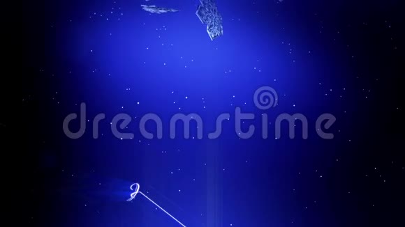 装饰的3d雪花在空气中缓慢地漂浮在蓝色背景下在夜间发光使用动画视频的预览图