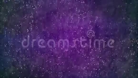 高清循环背景与漂亮的发光紫色尘埃视频的预览图